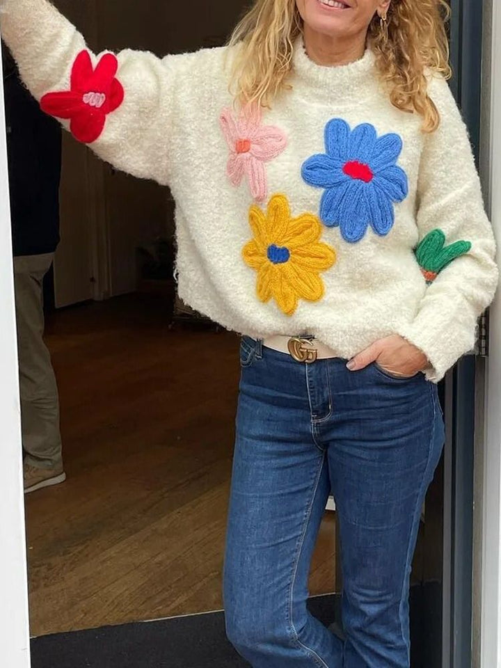Damski sweter oversize zimowy z kwiatami
