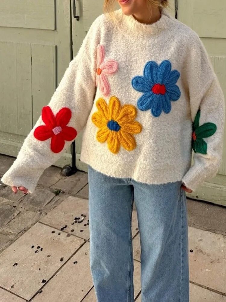 Damski sweter oversize zimowy z kwiatami