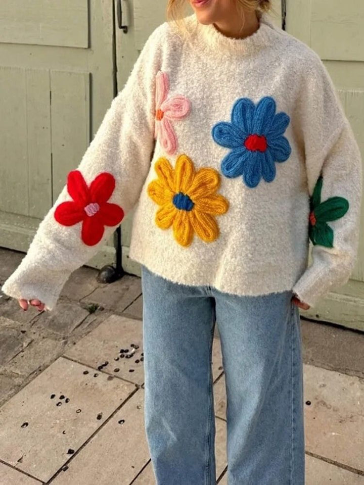 Damski sweter oversize zimowy z kwiatami