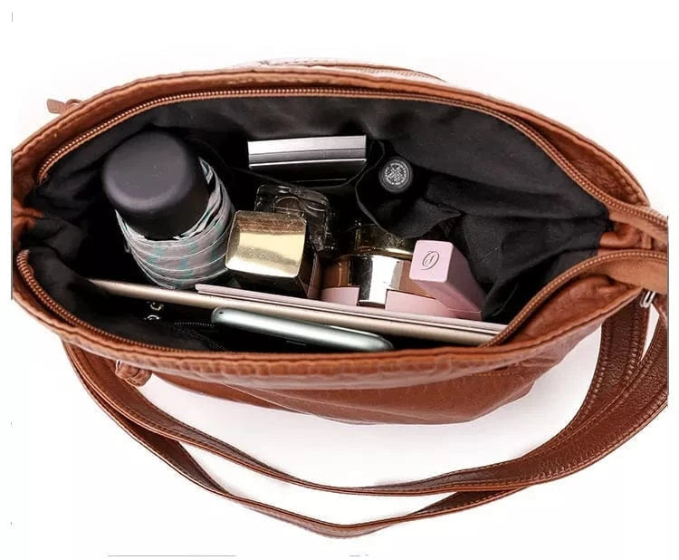 Kompaktowa łatwa do przenoszenia torba na ramię z regulowanym paskiem